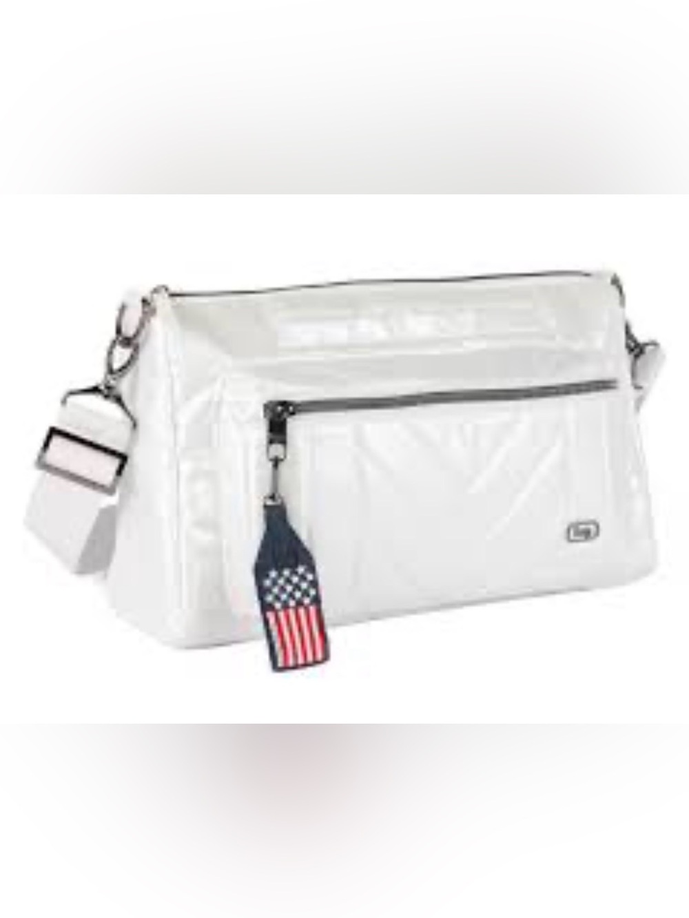 NWOT Lug LE Crossbody in a Pearly Beige Color.